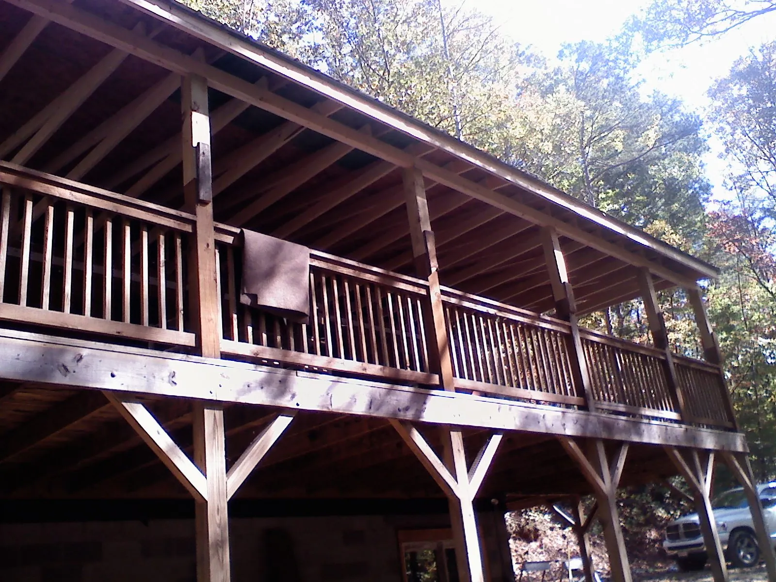 Timber framing under a new elevated porch and deck — Roof Leak Repair in Middleburg by Roofing Brothers